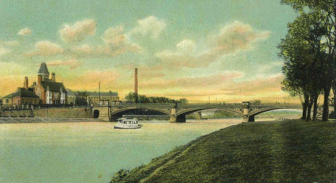 A view of Trent Bridge with a river, a bridge, a boat, and a field to the right A view of Trent Bridge with a river, a bridge, a boat, and a field to the right