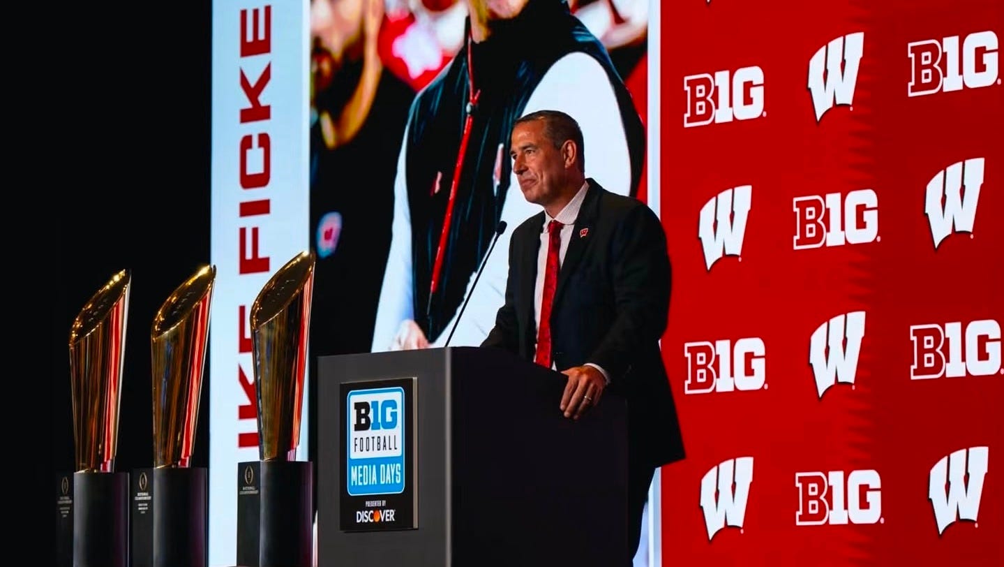 Wisconsin Badgers head coach Luke Fickell speaks at the podium during Big Ten Media Days in Chicago. Wisconsin Badgers head coach Luke Fickell speaks at the podium during Big Ten Media Days in Chicago.