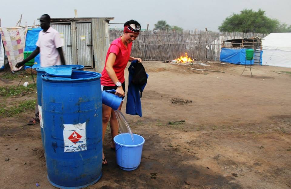 steph with water at camp