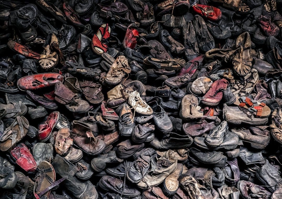 pile of assorted-color leather shoes pile of assorted-color leather shoes