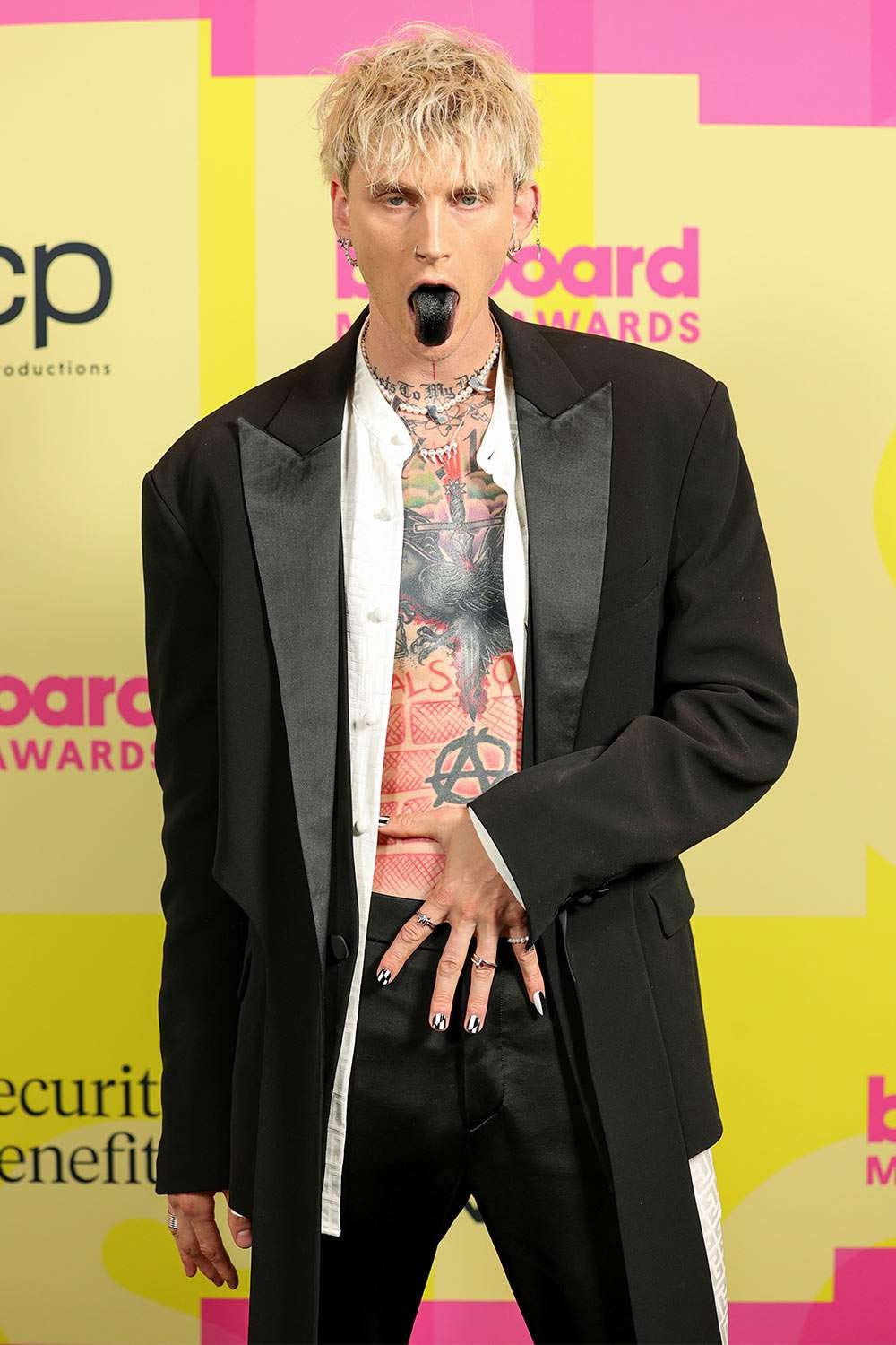 Machine Gun Kelly Dyes His Tongue Black at 2021 Billboard Music Awards