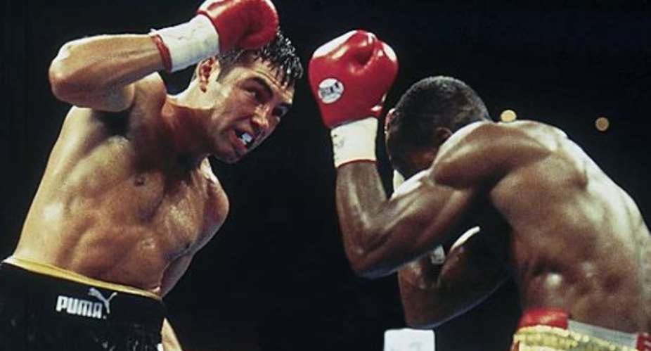 Oscar De La Hoya Celebrates Ike Quartey