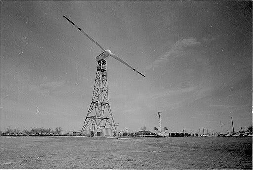 Black and white photo of an old-fashioned wind turbine