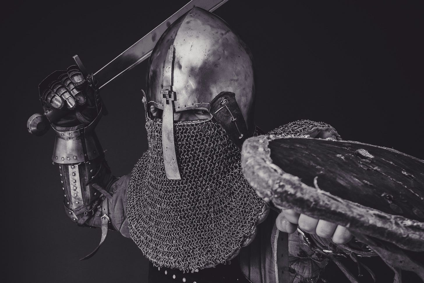 A knight swinging his sword. 