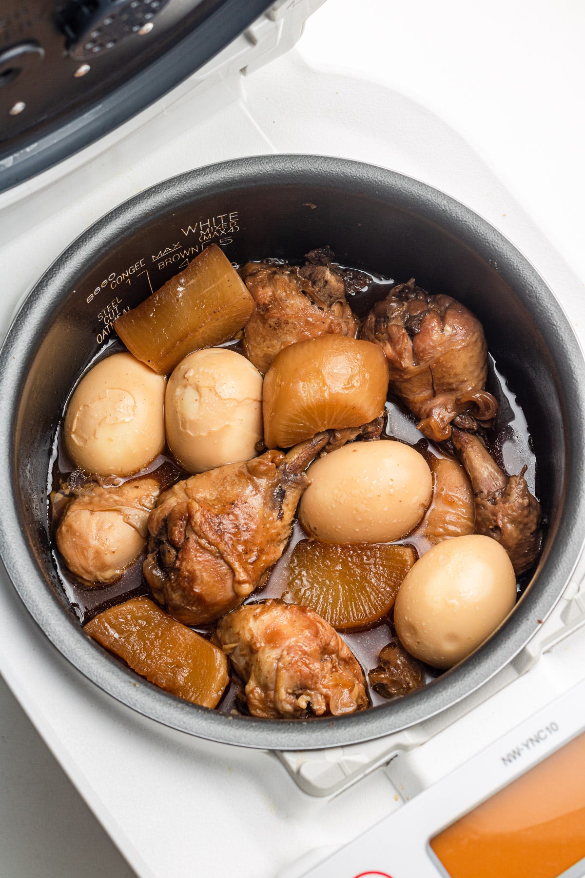 1-pot chicken and daikon in a rice cooker pot with soft boiled eggs
