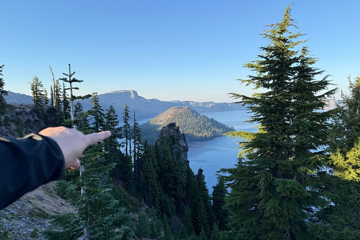 Golden mantel squirrel, phantom ship, Wizard Island, reading Crater Lake quarterly quide