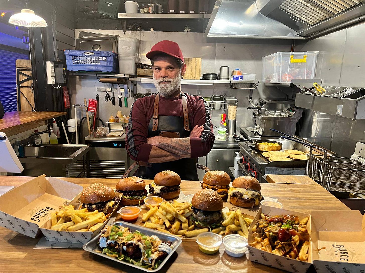 May be an image of 1 person and burger