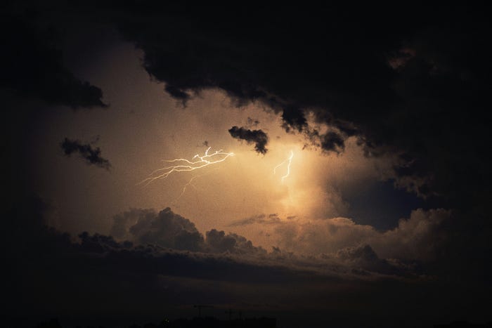 Lightning in the sky with a golden aura. Lightning in the sky with a golden aura.