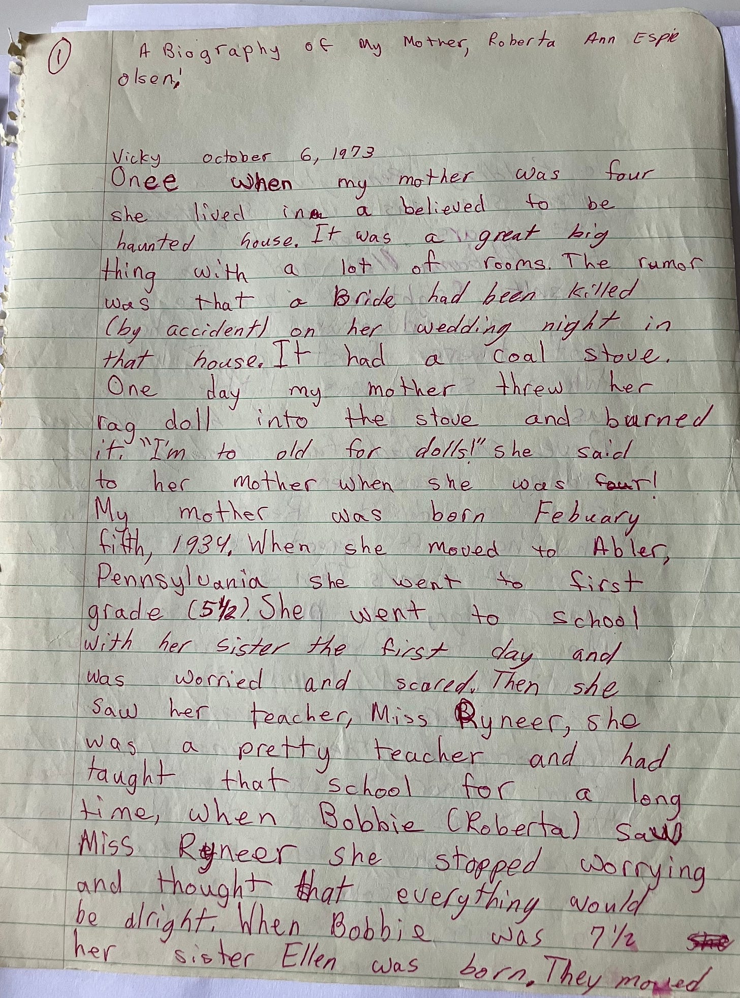 handwritten page title A Biography of My Mother Roberta Ann Espie Olsen, Vicky, October 6, 1973 in red ink torn from spiral notebook.