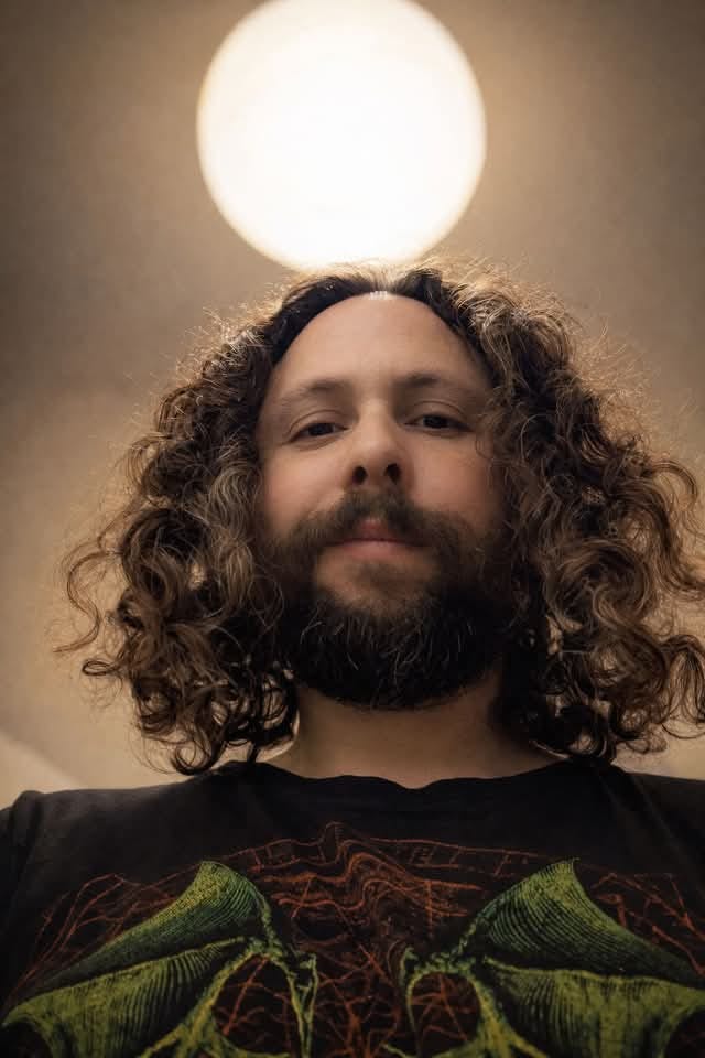 May be an image of one or more people, beard and eclipse