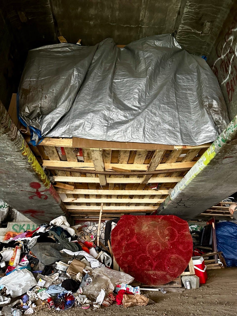 A room with a wooden floor and a pile of trash
Description automatically generated with medium confidence A room with a wooden floor and a pile of trash
Description automatically generated with medium confidence