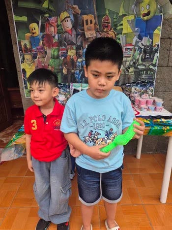 Rafa and Kuya Miguel before the party