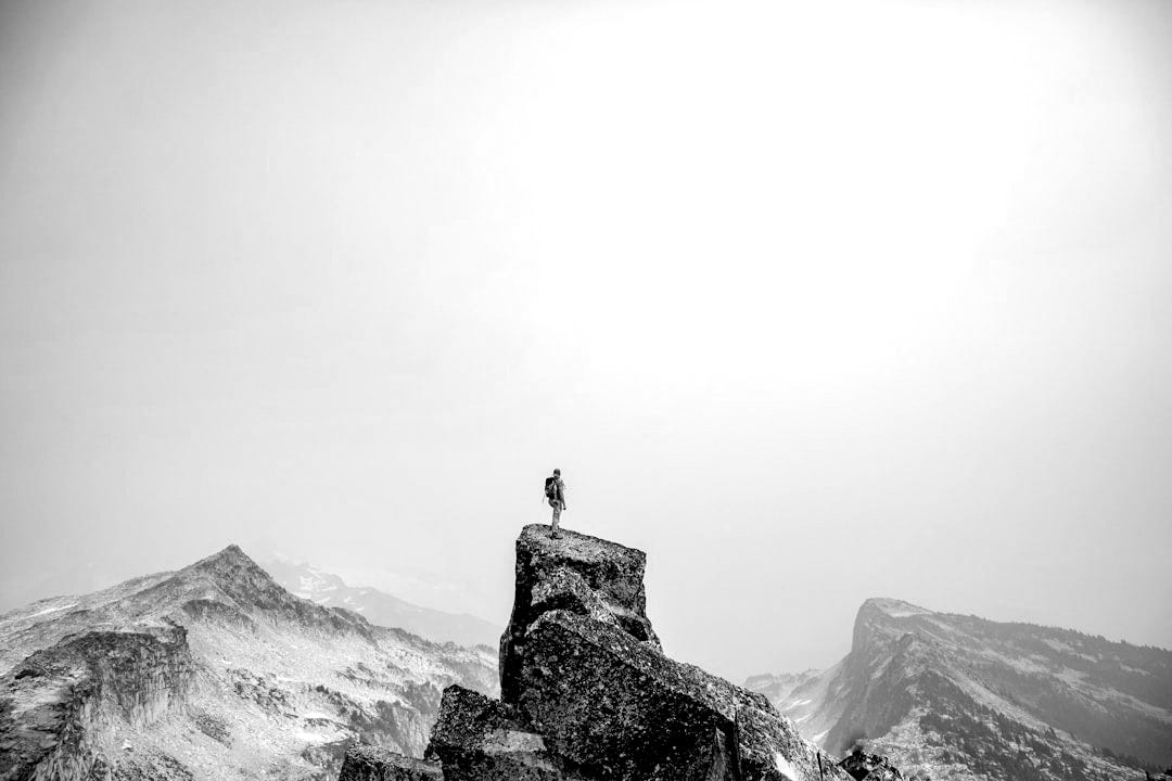 a person standing on top of a mountain