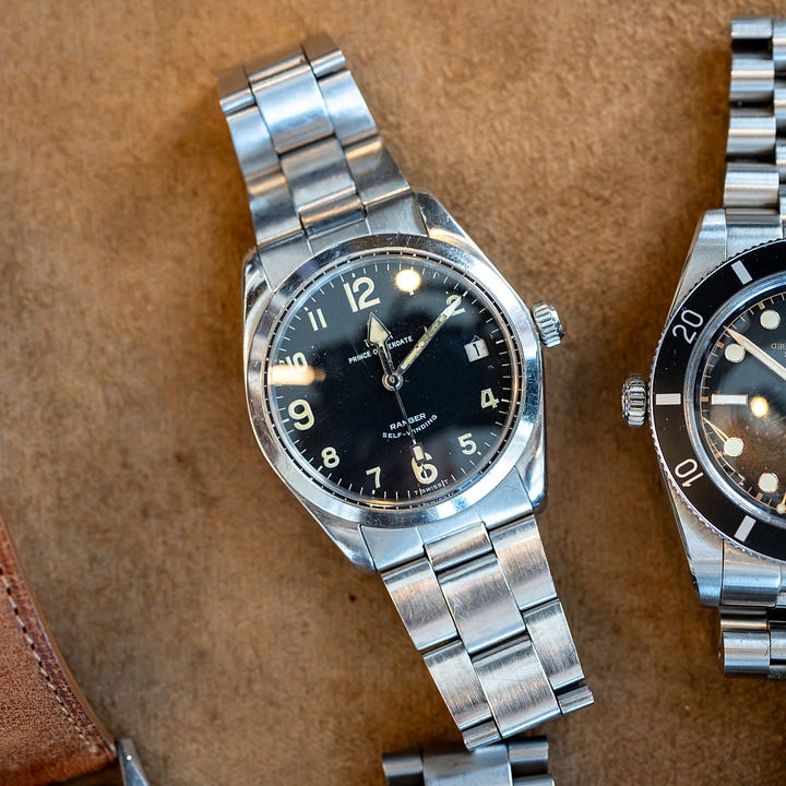 A rare Tudor Ranger with 12 Arabic numerals, and an early Rolex with black lacquer dial
