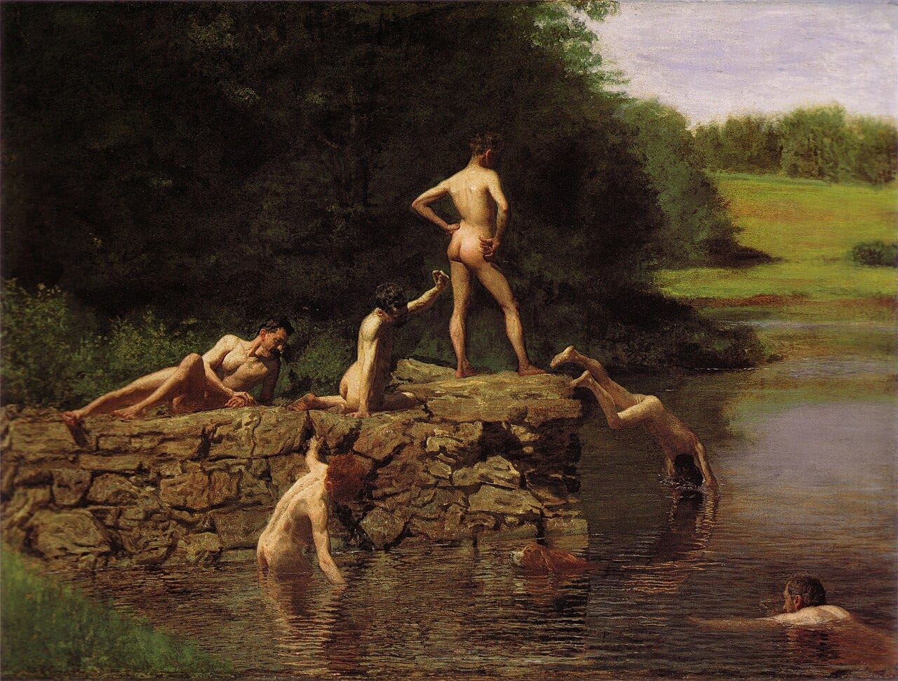 Six men and a dog on a rock above a creek Six men and a dog on a rock above a creek