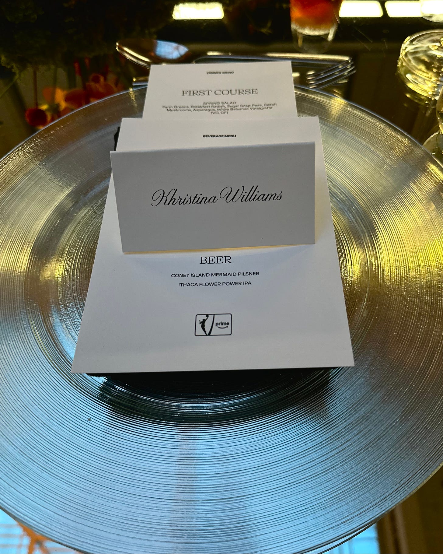 Khristina Williams's place card and menu at her seat at the WNBA on Prime Video 30th anniversary dinner inside Brooklyn Museum Khristina Williams's place card and menu at her seat at the WNBA on Prime Video 30th anniversary dinner inside Brooklyn Museum