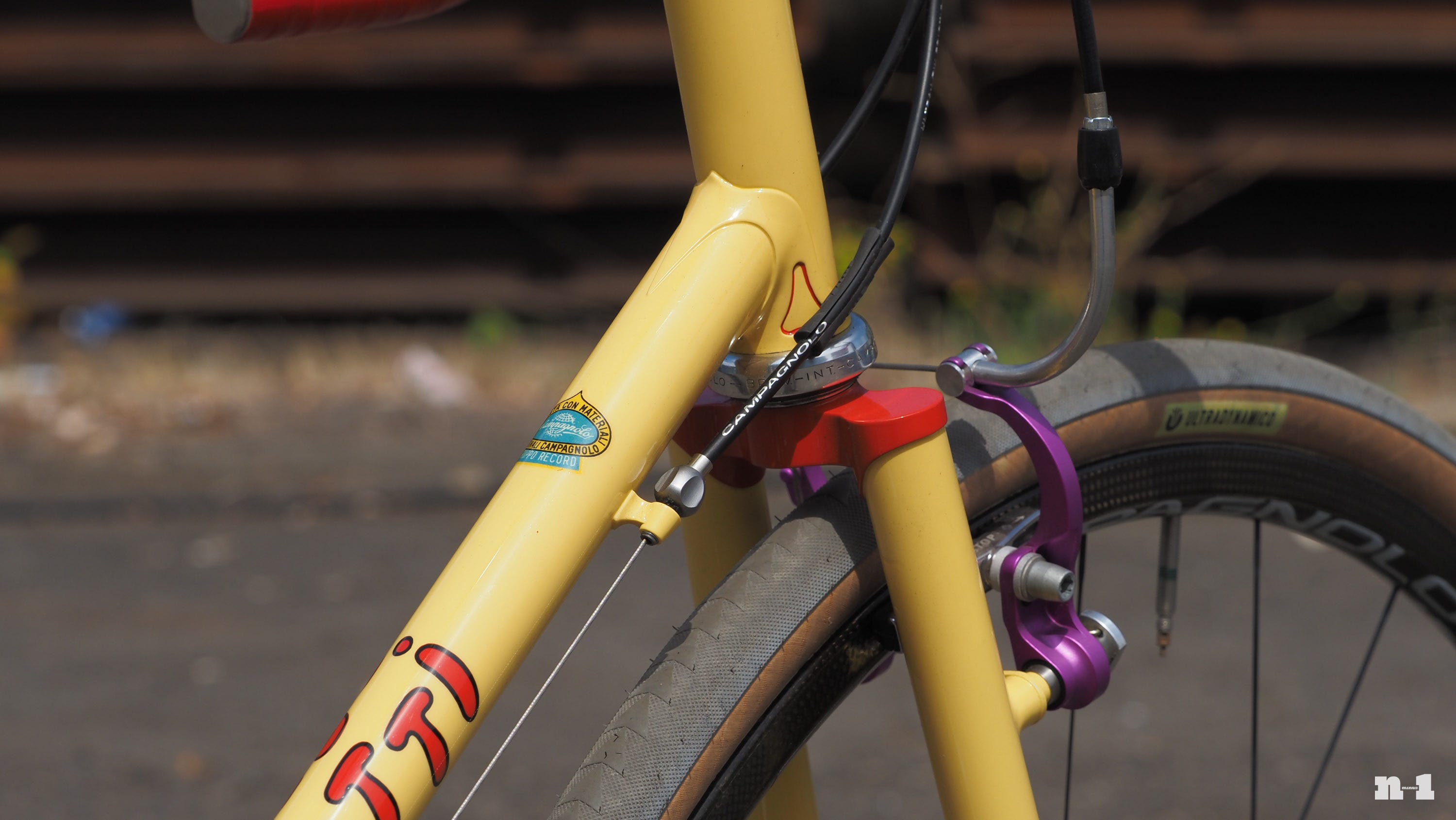 Marco Pedretti yellow road bike fork crown