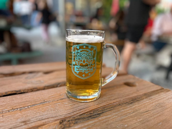 BLT, beer, cornhole, umbrellas, picnic tables