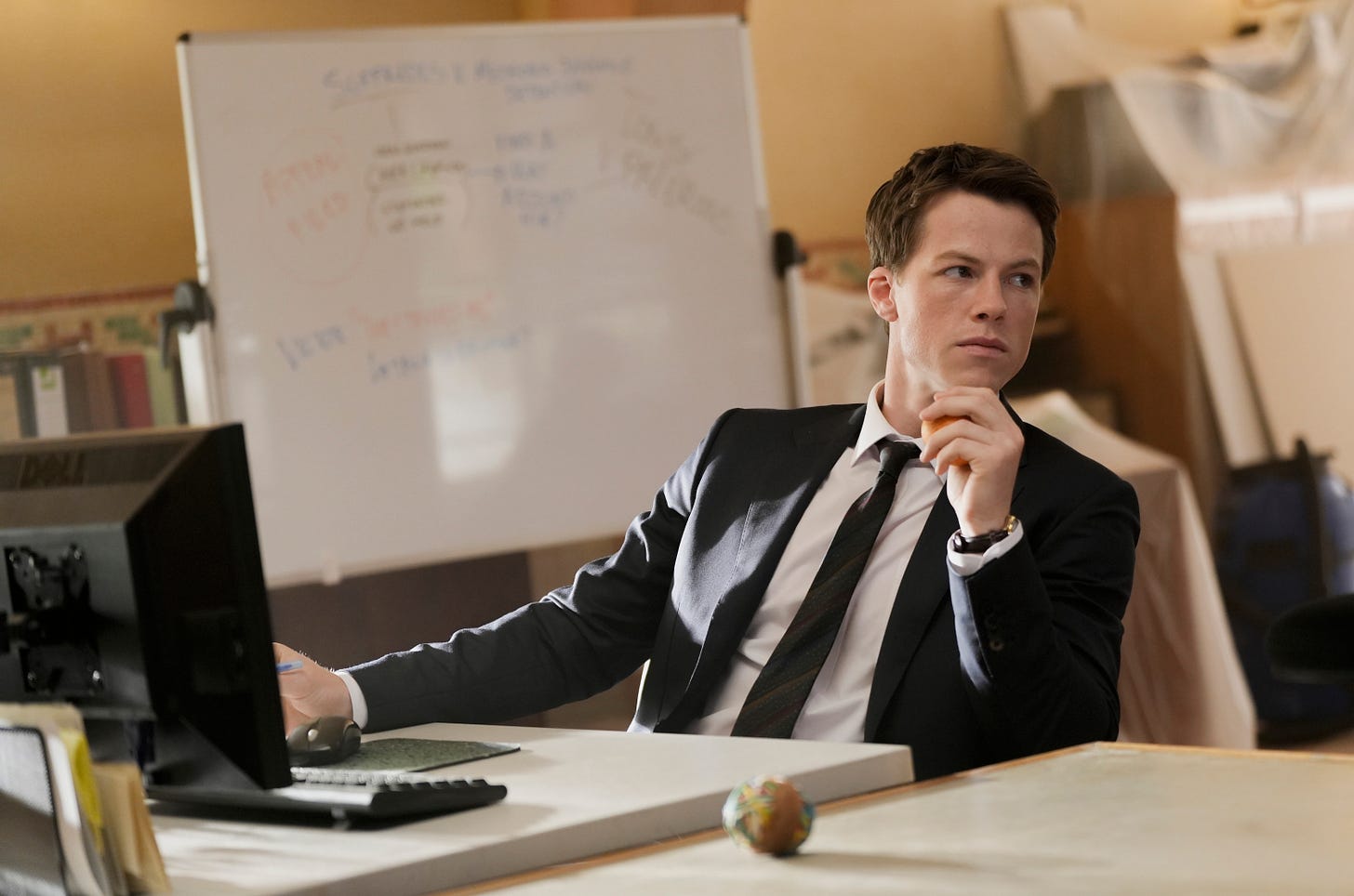 Milo Callaghan as Rudy Baylor in The Rainmaker Season 2 Episode 1 "Dear Uncle Rudy" at J. Lyman Stone and Associates law firm Milo Callaghan as Rudy Baylor in The Rainmaker Season 2 Episode 1 "Dear Uncle Rudy" at J. Lyman Stone and Associates law firm