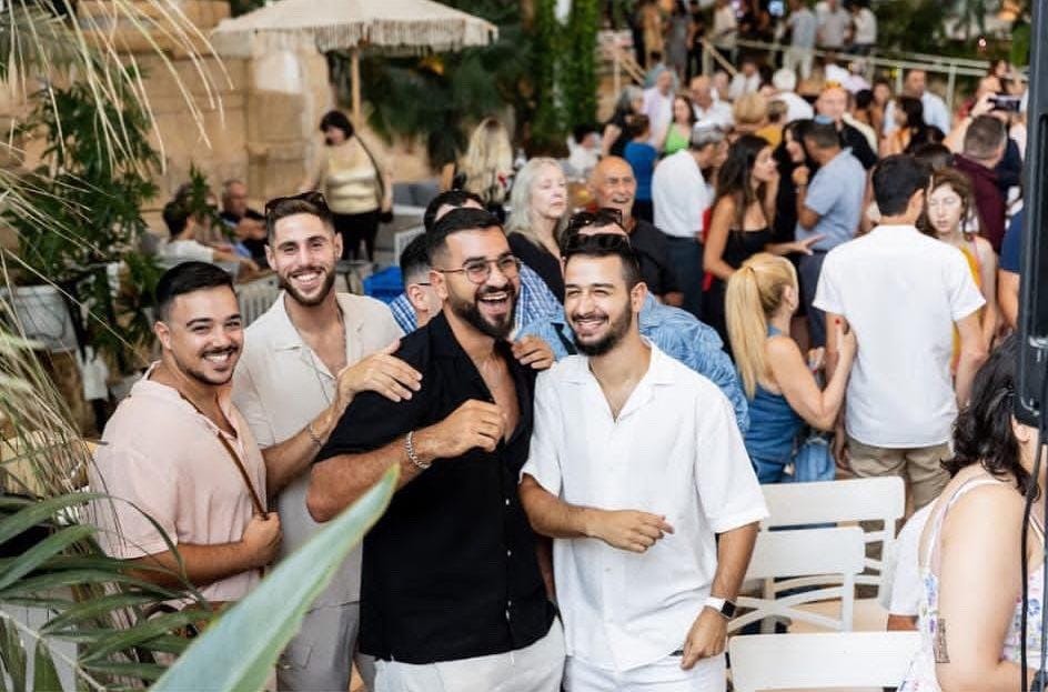 Ran Gvili (center, black shirt) with his friends.