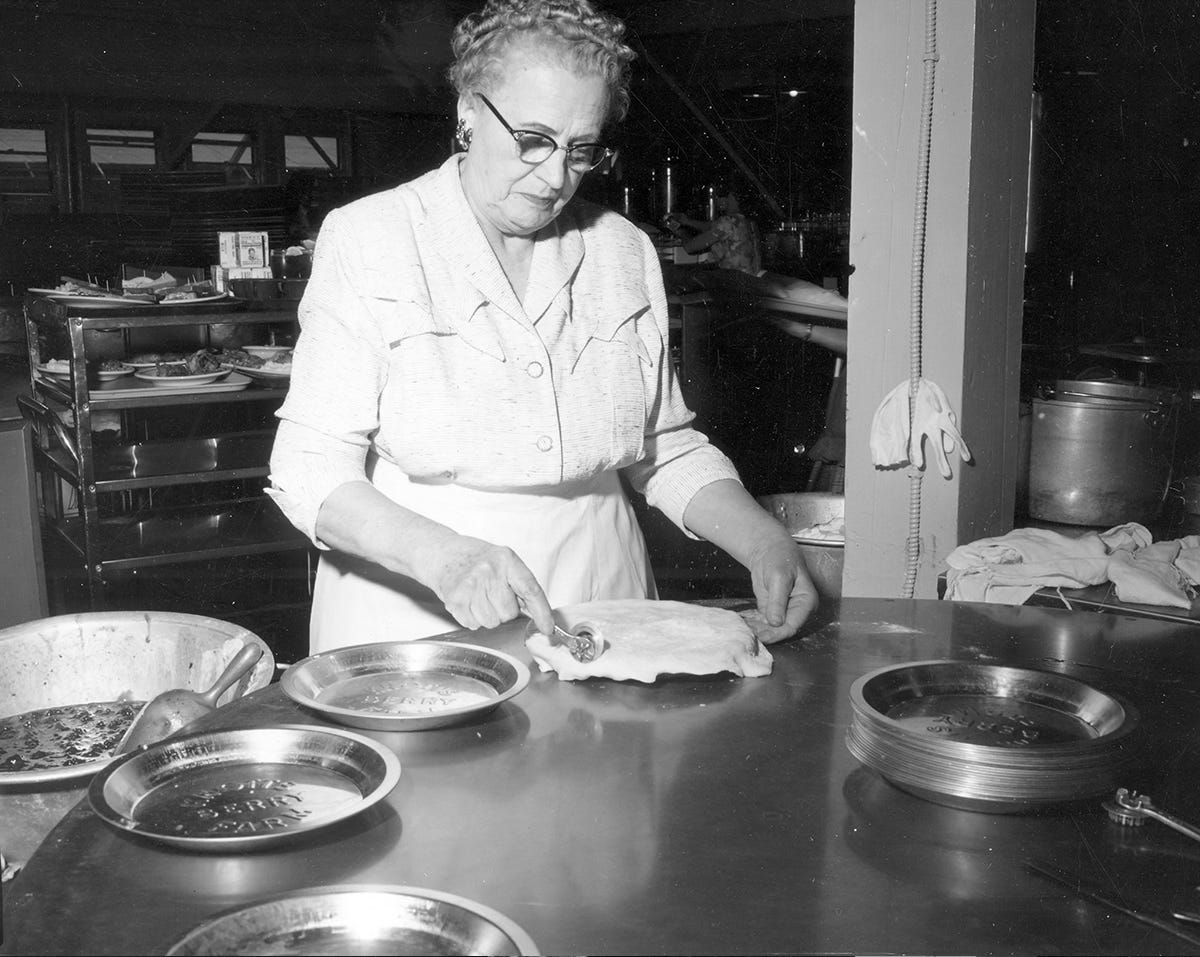 Cordelia Knott making pies for her chicken dinner restaurant