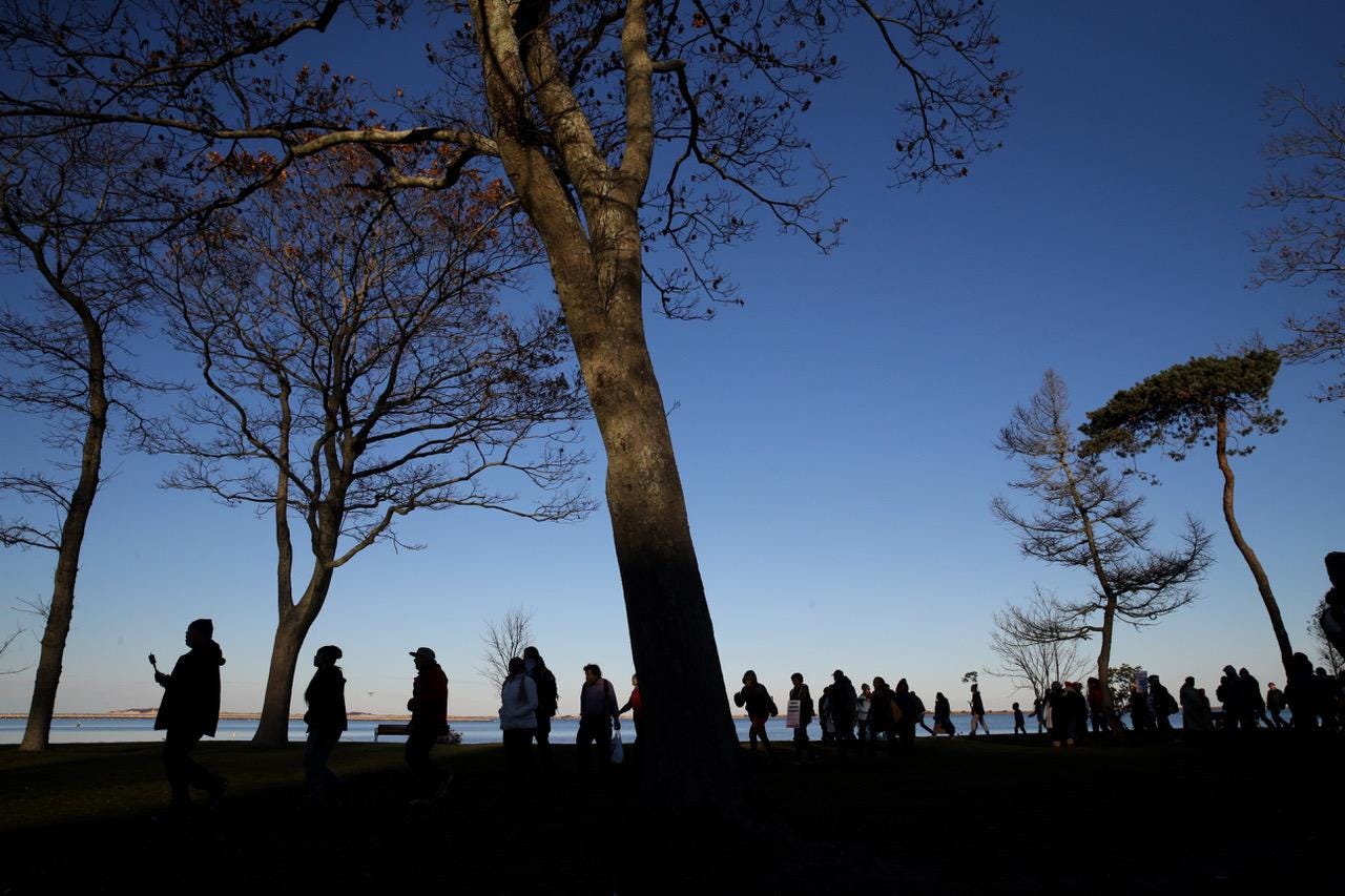 Marchers perform a Stomp Dance in Pilgrim Memorial State Park during the 48th National Day of Mourning in Plymouth, MA on Nov 23, 2017. Marchers perform a Stomp Dance in Pilgrim Memorial State Park during the 48th National Day of Mourning in Plymouth, MA on Nov 23, 2017.