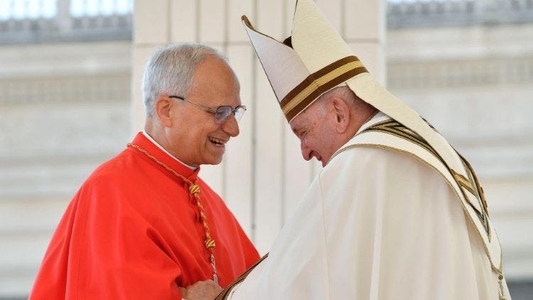 Pope Francis greets Cardinal Robert Prevost Pope Francis greets Cardinal Robert Prevost
