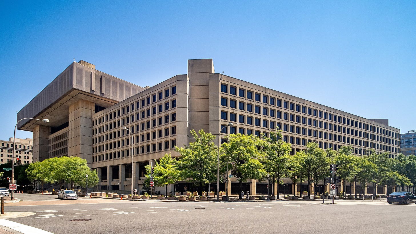 https://upload.wikimedia.org/wikipedia/commons/thumb/7/72/FBI_Headquarters_-_J._Edgar_Hoover_Building_%2853840035941%29.jpg/2560px-FBI_Headquarters_-_J._Edgar_Hoover_Building_%2853840035941%29.jpg