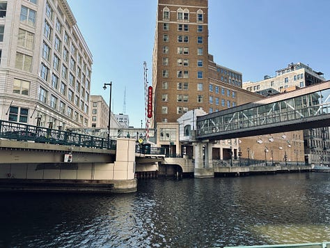 river, walkway, sculptures