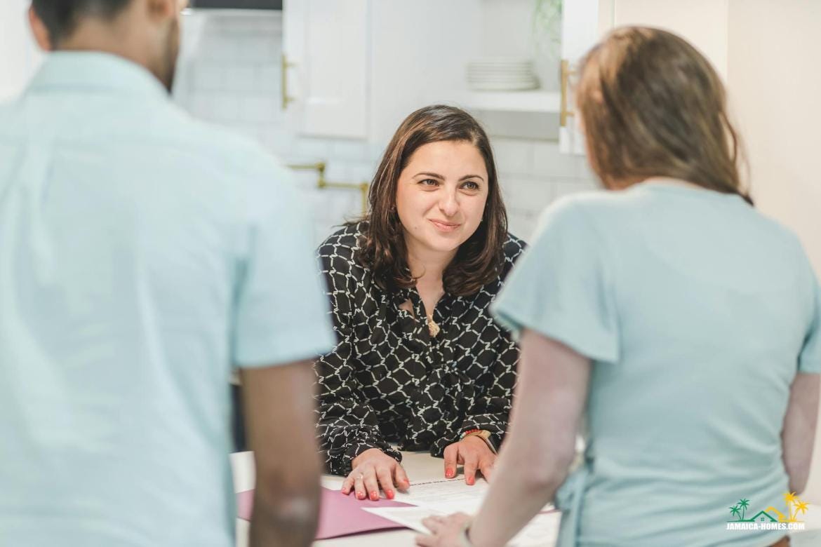 real estate agent discussing in front of her client