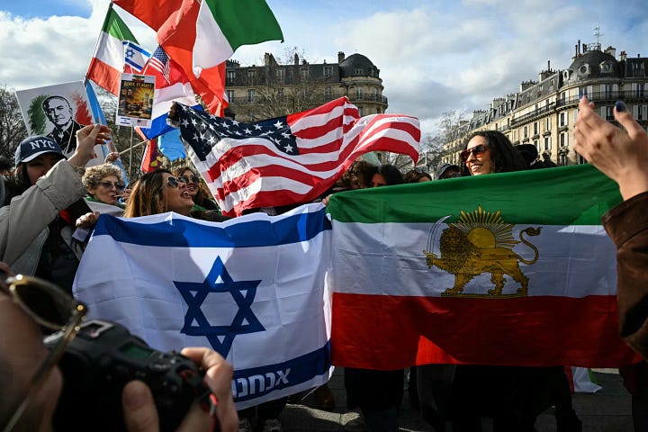 photos of people celebrating the attacks on Iran, waving U.S. and Israeli flags
