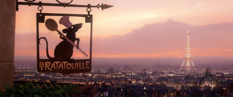 A sign for Remy the rat's restaurant, "La Ratatouille," hanging over the Paris skyline
