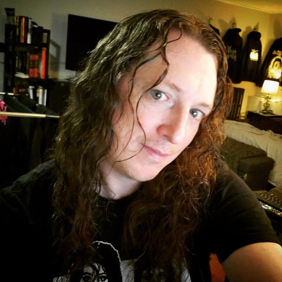A picture of me, Satanic Fragment, in my living room.