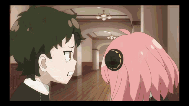 a boy with green hair and a girl with pink hair are looking at each other in a hallway a boy with green hair and a girl with pink hair are looking at each other in a hallway