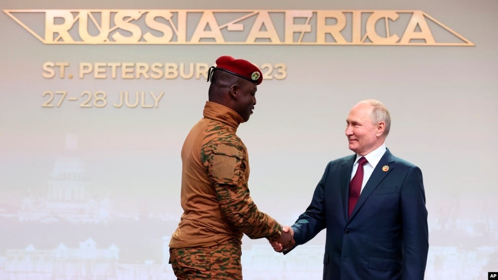 Burkina Faso's Captain Ibrahim Traore (left) and Russian President Vladimir Putin shake hands at the Russia-Africa Summit in St. Petersburg on July 27. Burkina Faso's Captain Ibrahim Traore (left) and Russian President Vladimir Putin shake hands at the Russia-Africa Summit in St. Petersburg on July 27.
