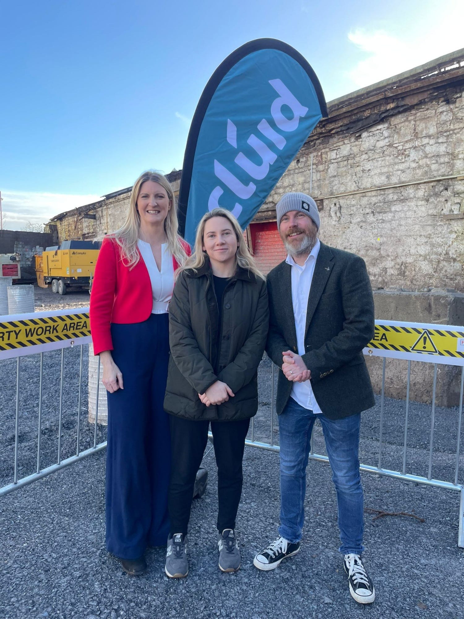 Photograph of Oliver Moran with Laura Harmon at the sod-turning of the Railyard Apartments at the site of the former Sextant.