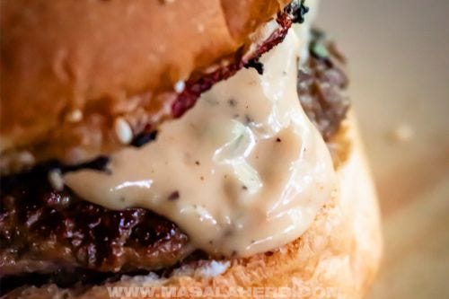Big Mac sauce close up in a burger