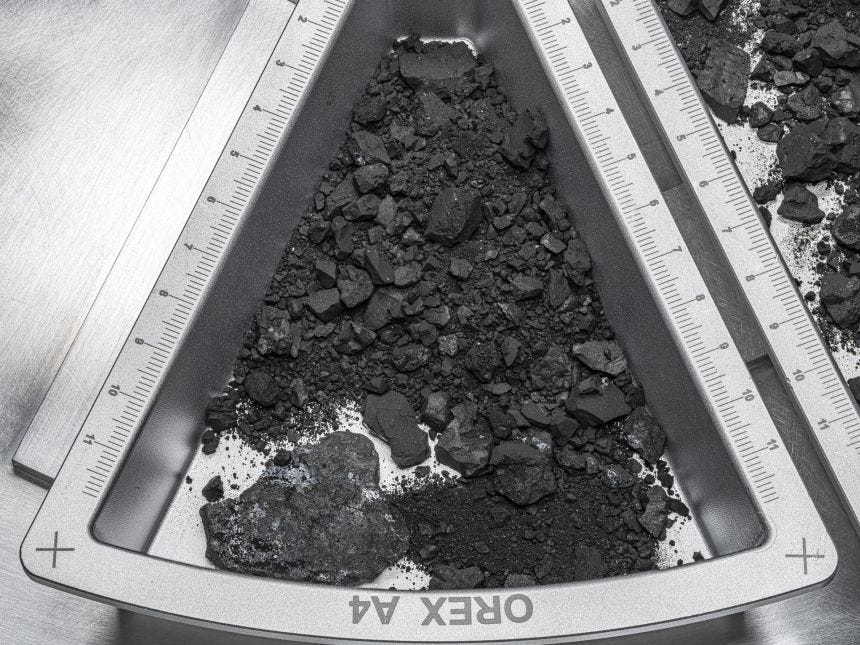 A container holding rocks and dust from asteroid Bennu. A container holding rocks and dust from asteroid Bennu.