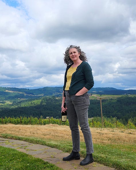 Beautiful natural wine, Oregon Vineyard, budding vines, wine with a view