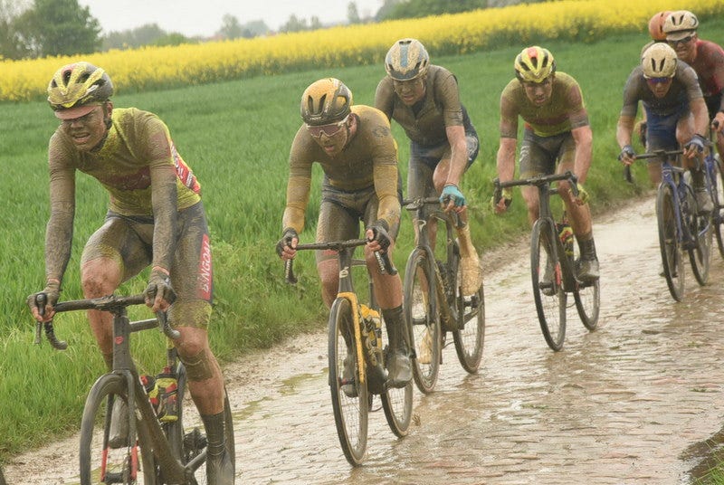 Michiel Lambrecht and I alongside 3 other riders on the first few pavés of 22. The cobbles covered in a greasy slime Michiel Lambrecht and I alongside 3 other riders on the first few pavés of 22. The cobbles covered in a greasy slime