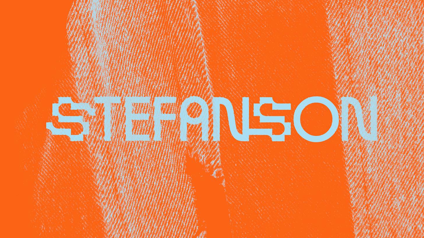 The word “STEFANSON” in a geometric, custom typeface over a blue-toned denim texture on a vivid orange background.