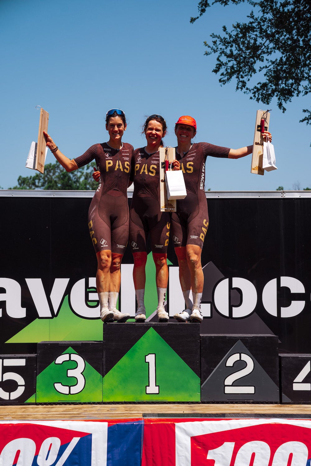 Women's podium at Gravel Locos 2025, a PAS Racing clean sweep with Karolina Migoń first, Emily Newsom second and Morgan Aguirre in third Women's podium at Gravel Locos 2025, a PAS Racing clean sweep with Karolina Migoń first, Emily Newsom second and Morgan Aguirre in third