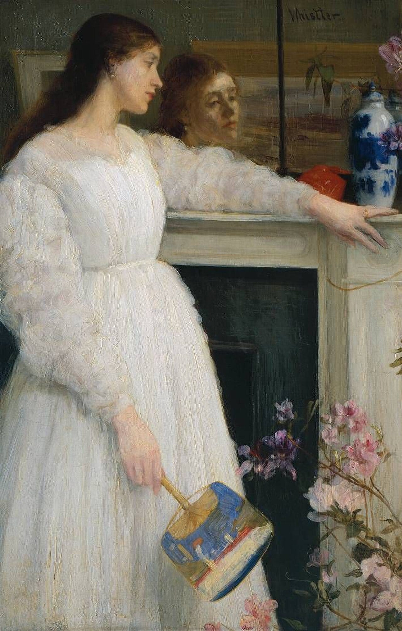 Woman in white dress standing by a fireplace mirror holding a fan Woman in white dress standing by a fireplace mirror holding a fan