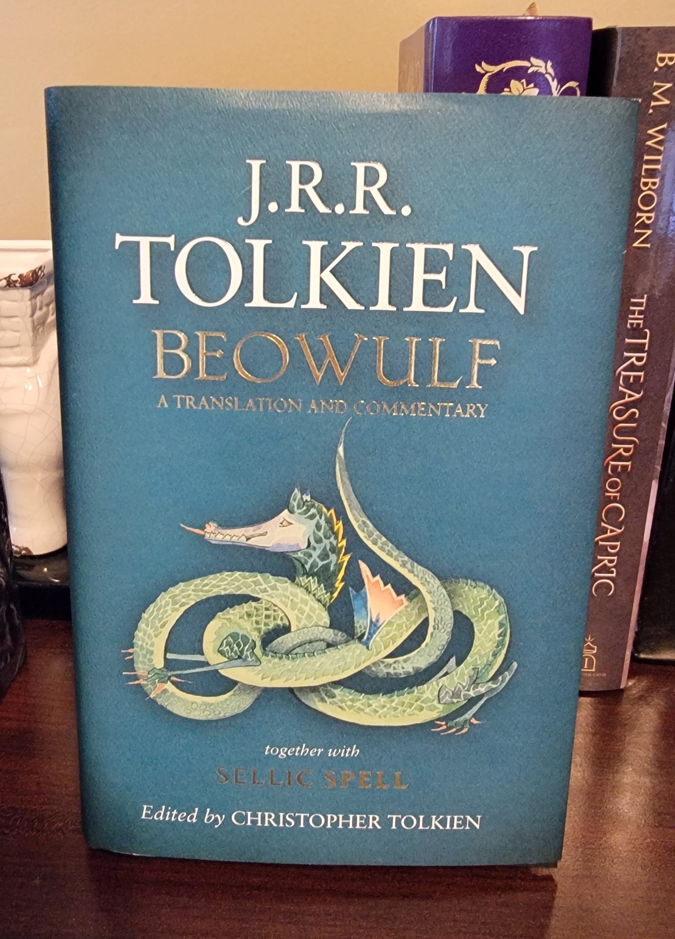 A hardback copy of Beowulf translated by JRR Tolkien