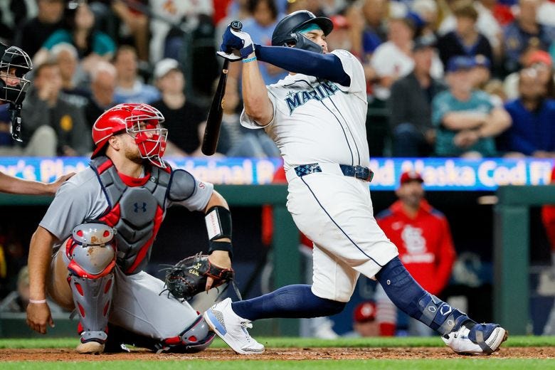 The Mariners&#8217; Josh Naylor hits the go-ahead solo home run during the fourth inning Tuesday in Seattle. (Jennifer Buchanan / The Seattle Times)