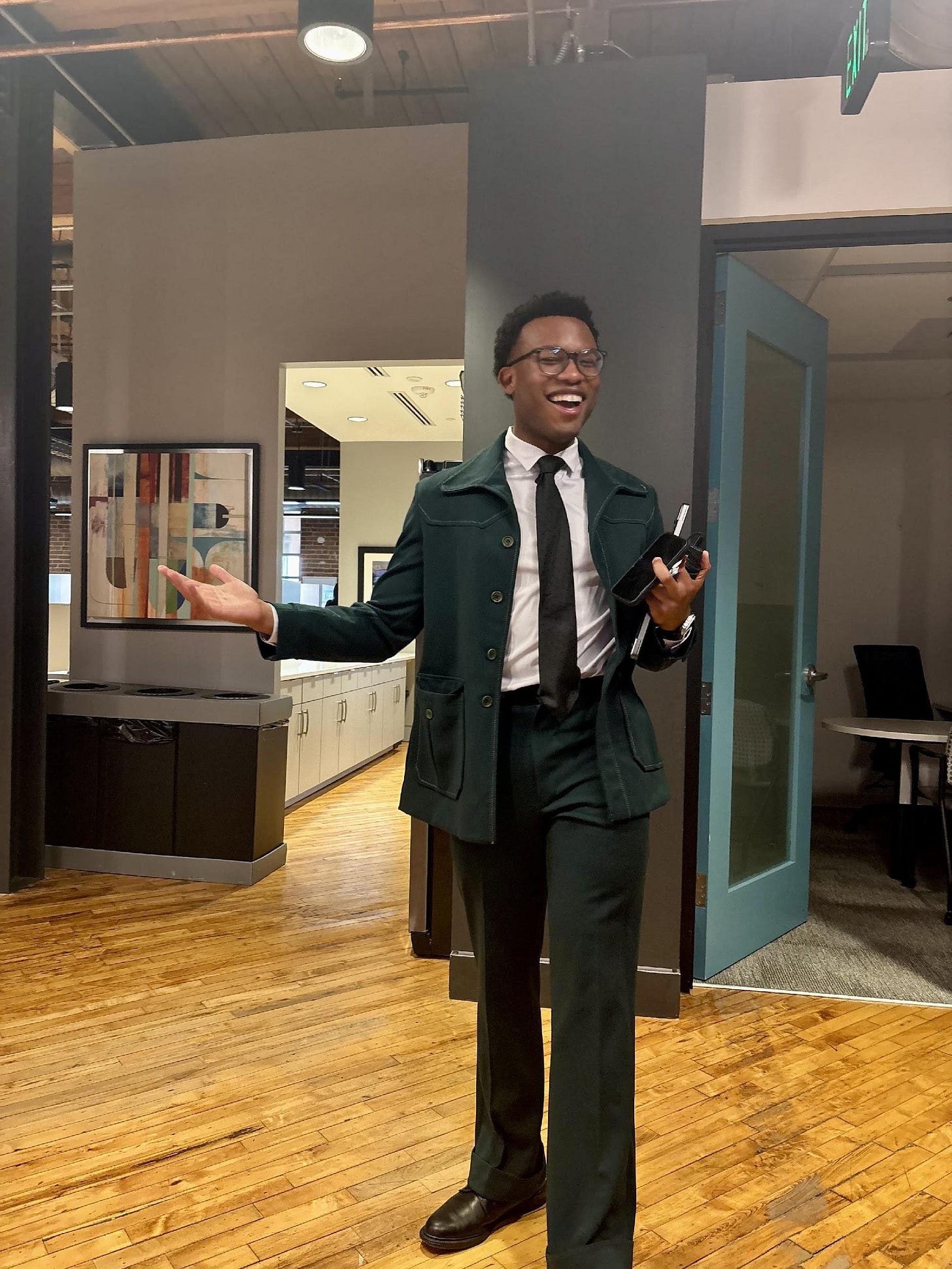 A person in a suit
AI-generated content may be incorrect. A person in a suit
AI-generated content may be incorrect.