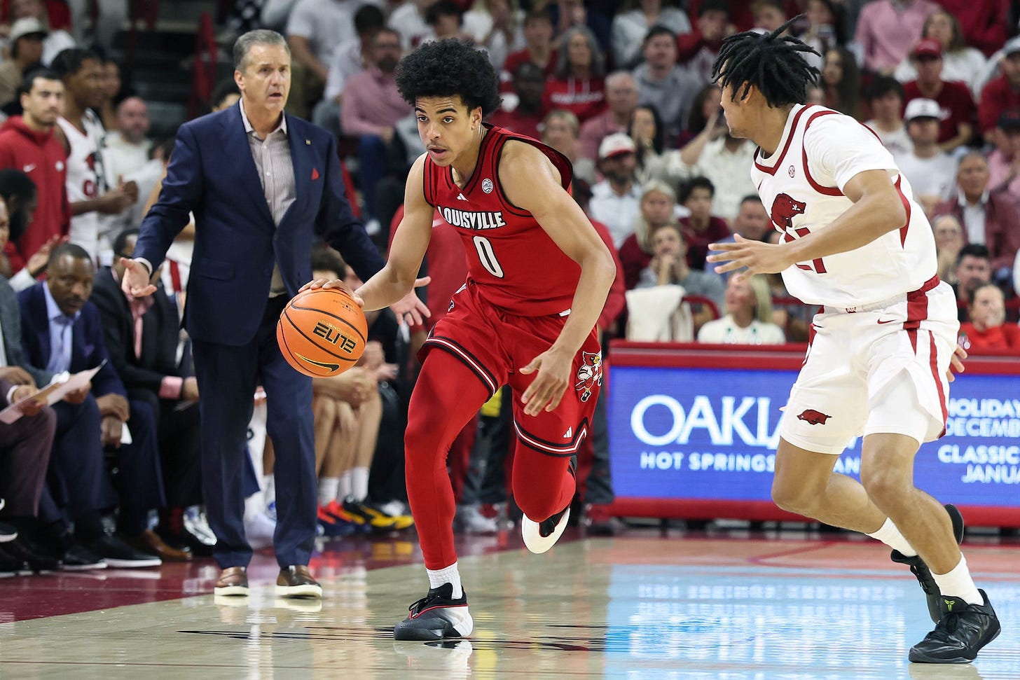 Louisville star freshman Mikel Brown Jr. (back) out vs. Tennessee | Reuters