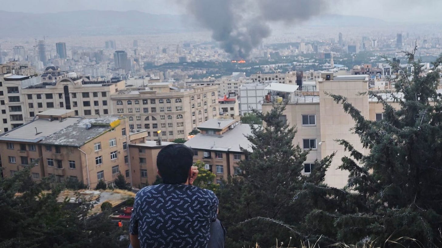 Smoke rises after a reported Israeli strike on a building used by Islamic Republic of Iran News Network, part of Iran's state TV broadcaster, on June 16 in Tehran. Smoke rises after a reported Israeli strike on a building used by Islamic Republic of Iran News Network, part of Iran's state TV broadcaster, on June 16 in Tehran.