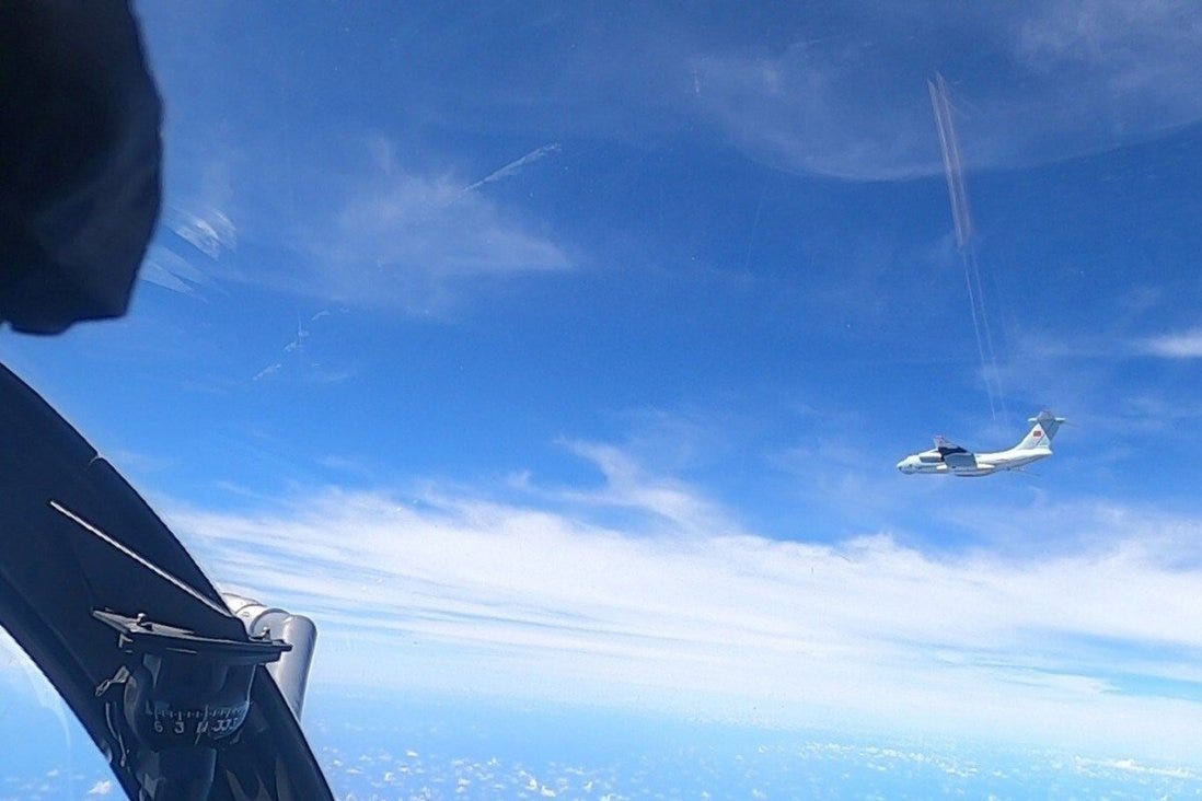 A plane with a Chinese flag on its tail in a picture supplied by the Royal Malaysian Air Force on Monday. Photo: Reuters A plane with a Chinese flag on its tail in a picture supplied by the Royal Malaysian Air Force on Monday. Photo: Reuters