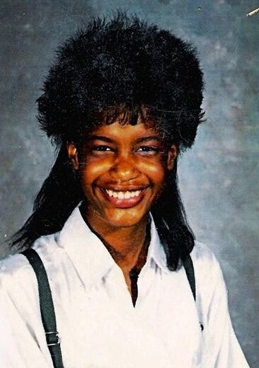Black girl and a Black Man with Mullets hair style.